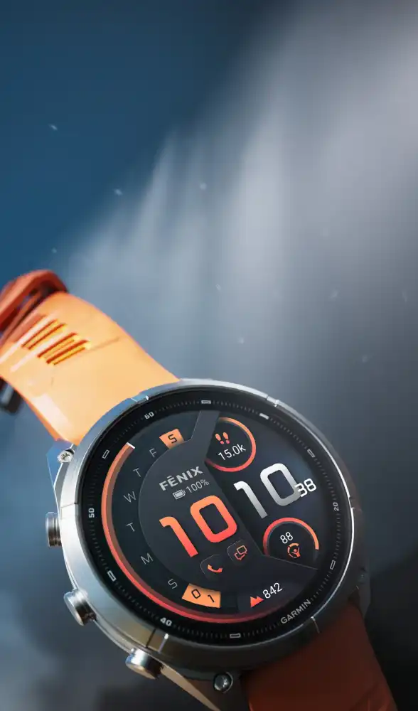 Narancssárga szíjas Garmin Fénix 9 pro okosóra színes AMOLED-kijelzővel.