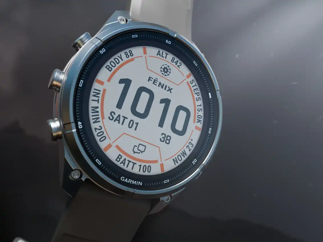Narancssárga szíjas Garmin Fénix 9 pro okosóra színes AMOLED-kijelzővel.